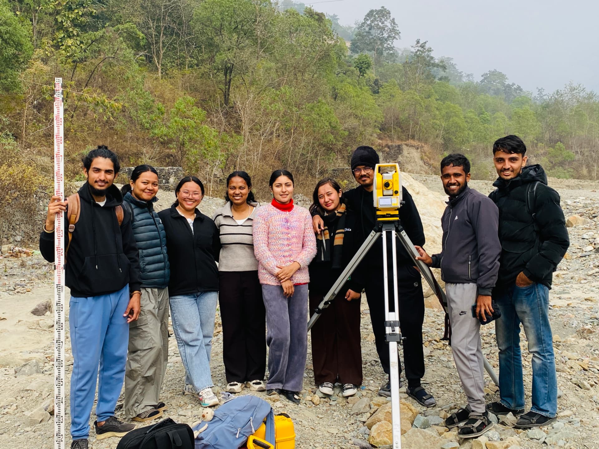 Field survey work with the team and total station