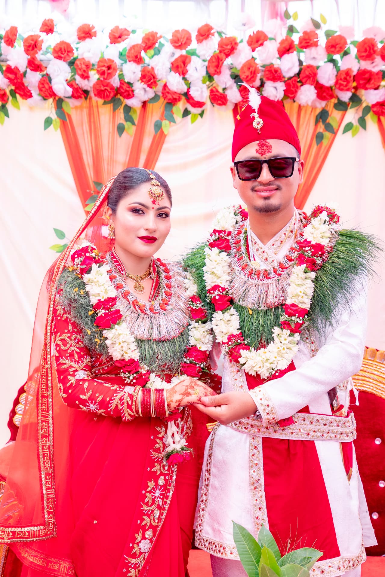 Wedding ceremony under a floral mandap